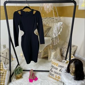 Black bodycon Bebe dress with cut outs size small